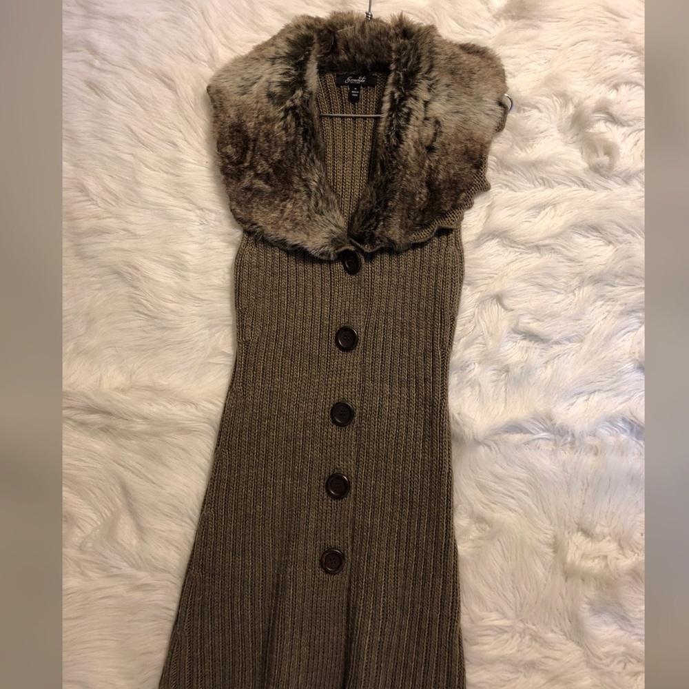 Gorgeous sleeveless cardigan.